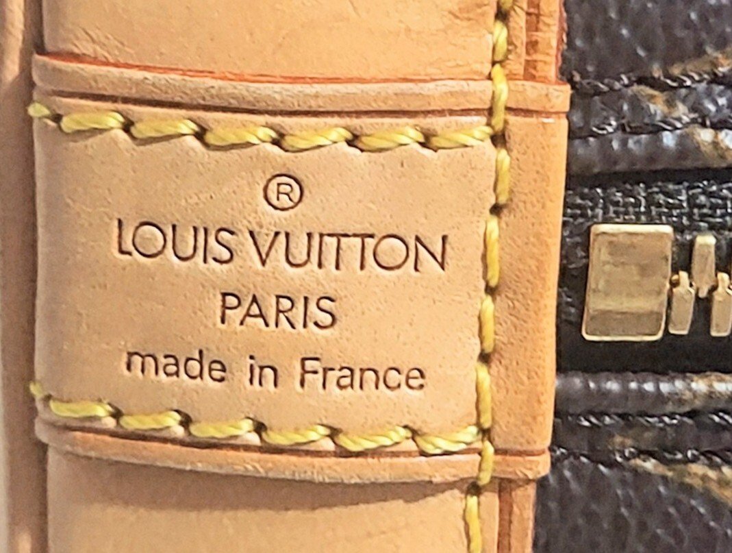Louis Vuitton Alma Handbag