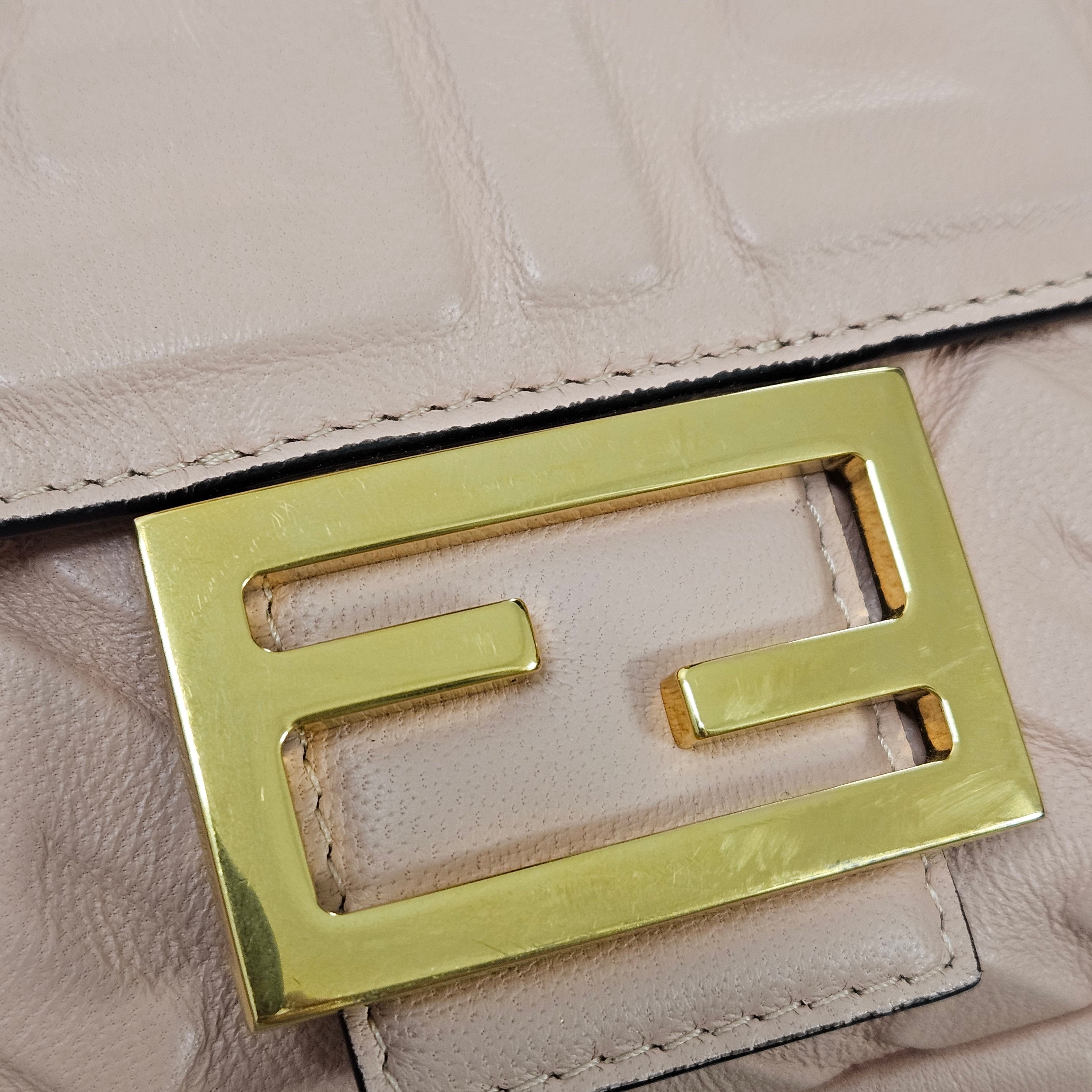Fendi – Baguette Embossed Monogram FF Crossbody Bag